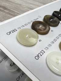 OP282 ポリエステル樹脂製 水牛調 4つ穴ボタン 大阪プラスチック工業(DAIYA BUTTON) サブ画像